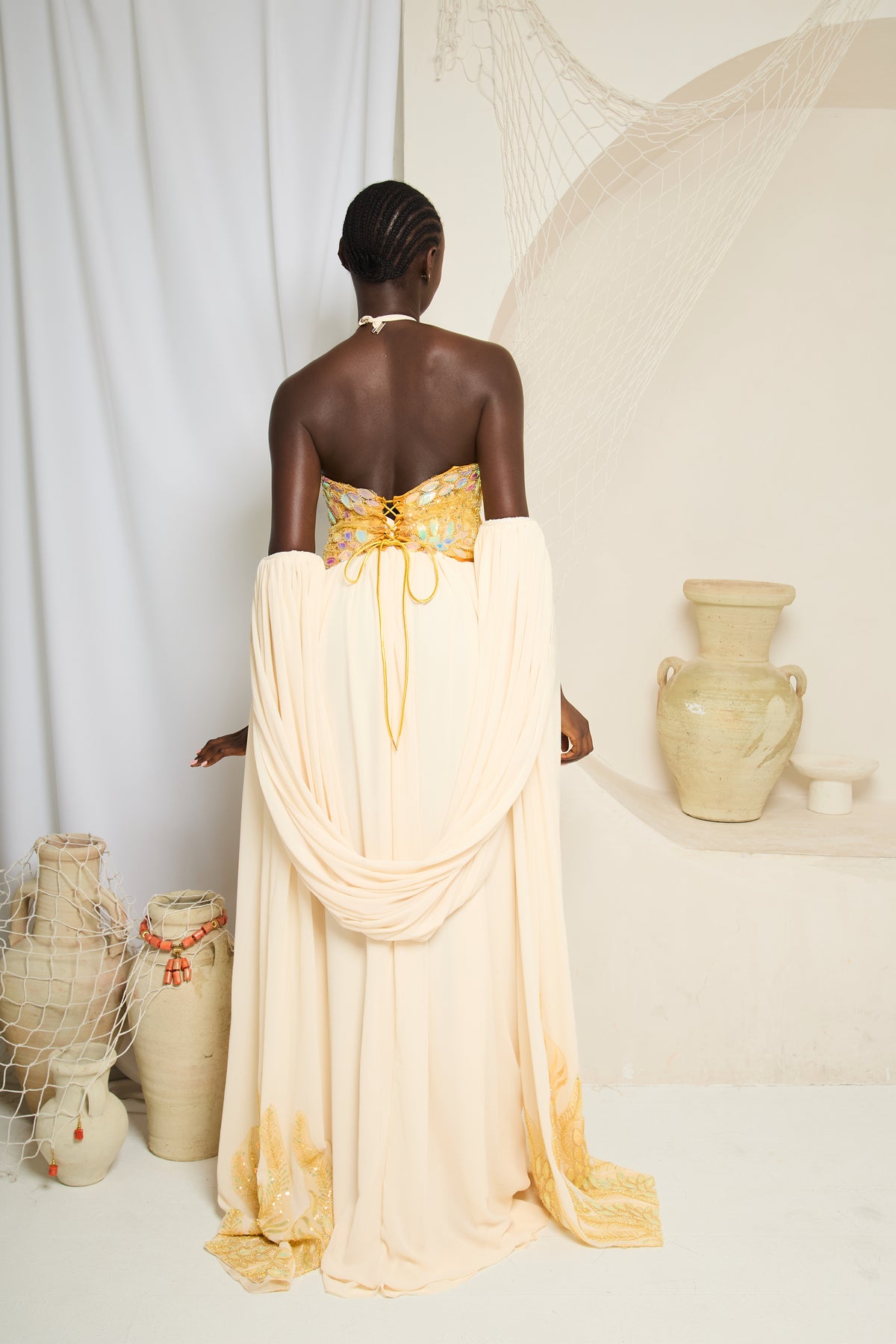 Erema - Ivory Cape Gown with Gold Waist Detail - Batch 02 Pre-Order Twin By Tare Isaac Erema - Ivory Cape Gown with Gold Waist Detail - Batch 02 Pre-Order Twin By Tare Isaac